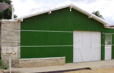 Imagem: A casa possui 2 Dormitórios, 1 Banheiro, 1 Vaga na garagem