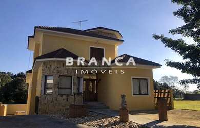 Imagem: A casa possui 5 Dormitórios, 5 Banheiros, 5 Vagas na garagem