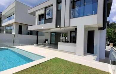 Imagem: A casa em condomínio à venda possui 4 Dormitórios, 5 Banheiros