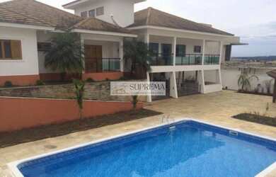 Imagem: A casa em condomínio possui 4 Dormitórios, 4 Banheiros, 5