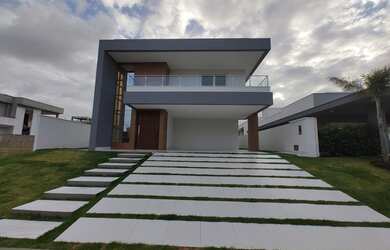 Imagem: A casa em condomínio possui 5 Dormitórios, 5 Banheiros, 2