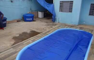 Imagem: A casa possui 3 Dormitórios, 1 Banheiro, 1 Vaga na garagem