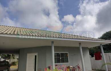 Imagem: A casa possui 3 Dormitórios, 2 Banheiros, 5 Vagas na garagem