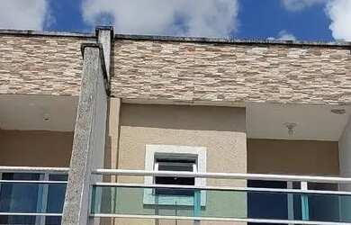 Imagem: A casa possui 2 Dormitórios, 3 Banheiros e 2 Vagas na garagem