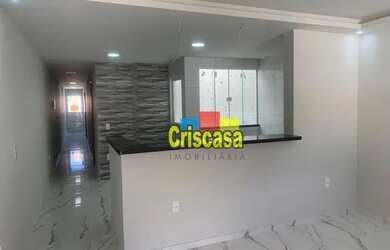 Imagem: A casa possui 2 Dormitórios, 2 Banheiros, 3 Vagas na garagem