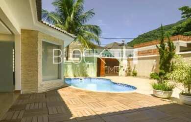 Imagem: A casa em condomínio possui 4 Dormitórios, 4 Banheiros, 4