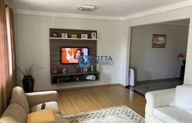 Imagem: A casa possui 2 Dormitórios, 2 Banheiros, 3 Vagas na garagem