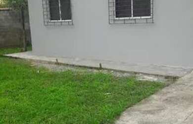 Imagem: A casa possui 3 Dormitórios, 1 Banheiro, 1 Vaga na garagem