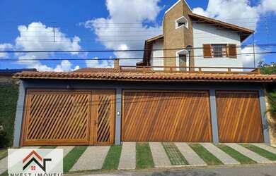 Imagem: A casa possui 4 Dormitórios, 5 Banheiros, 5 Vagas na garagem