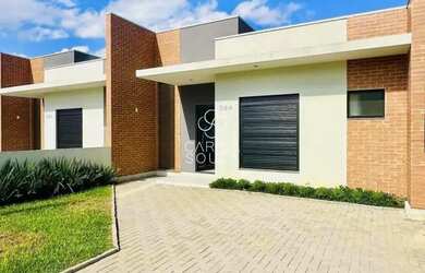 Imagem: A casa possui 3 Dormitórios, 3 Banheiros, 3 Vagas na garagem