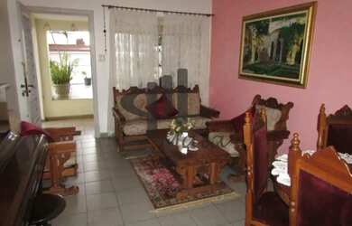 Imagem: A casa possui 3 Dormitórios, 2 Banheiros, 3 Vagas na garagem