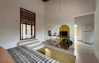 Imagem: A casa possui 1 Dormitório, 1 Banheiro, 1 Vaga na garagem