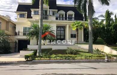 Imagem: A casa em condomínio possui 5 Dormitórios, 5 Banheiros, 5