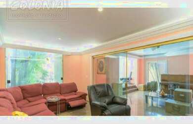 Imagem: A casa possui 3 Dormitórios, 5 Banheiros, 3 Vagas na garagem