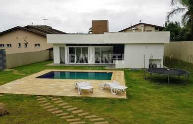 Imagem: A casa em condomínio possui 4 Dormitórios, 5 Banheiros, 5