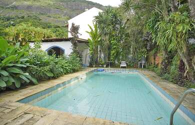 Imagem: Casa convidativa cercada pela natureza