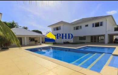 Imagem: A casa em condomínio para alugar possui 5 Dormitórios, 5 Banheiros