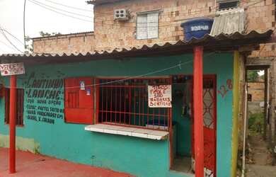 Imagem: A casa possui 2 Dormitórios, 2 Banheiros, Ar-condicionado e