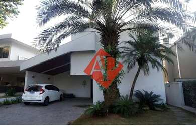 Imagem: A casa em condomínio possui 4 Dormitórios, 4 Banheiros, 5