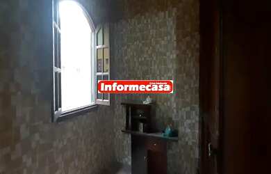 Imagem: A casa possui 2 Dormitórios, 1 Banheiro, 70m² de Área, Churrasqueira