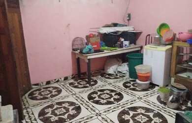 Imagem: A casa possui 4 Dormitórios, 2 Banheiros, 2 Vagas na garagem