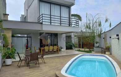 Imagem: A casa possui 3 Dormitórios, 4 Banheiros, 4 Vagas na garagem