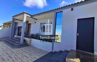 Imagem: A casa possui 3 Dormitórios, 4 Banheiros, 4 Vagas na garagem