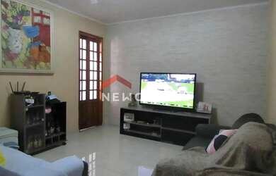 Imagem: A casa possui 3 Dormitórios, 2 Banheiros, 2 Vagas na garagem