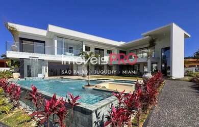 Imagem: A casa em condomínio possui 4 Dormitórios, 5 Banheiros, 5