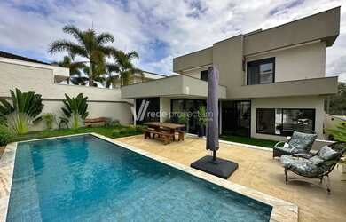 Imagem: A casa em condomínio à venda possui 4 Dormitórios, 5 Banheiros