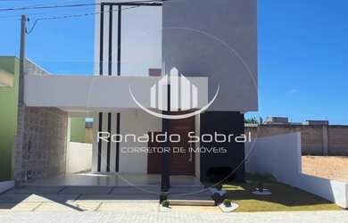 Imagem: A casa possui 3 Dormitórios, 3 Banheiros, 2 Vagas na garagem