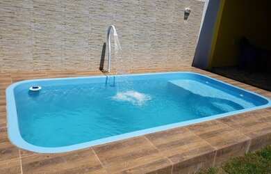 Imagem: A casa possui 2 Dormitórios, 2 Banheiros, 2 Vagas na garagem