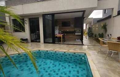 Imagem: A casa em condomínio possui 4 Dormitórios, 5 Banheiros, 4