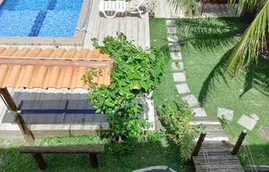 Imagem: A casa possui 4 Dormitórios, 3 Vagas na garagem e está localizado