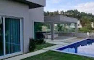 Imagem: A casa em condomínio possui 5 Dormitórios, 5 Banheiros, 5