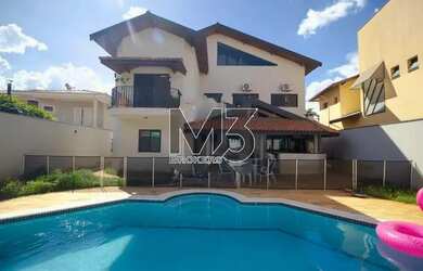 Imagem: A casa possui 5 Dormitórios, 5 Banheiros, 5 Vagas na garagem