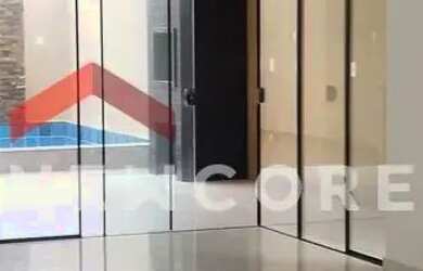 Imagem: A casa possui 3 Dormitórios, 4 Banheiros, 2 Vagas na garagem