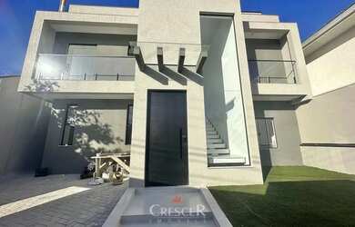 Imagem: A casa à venda possui 4 Dormitórios, 5 Banheiros, 3 Vagas