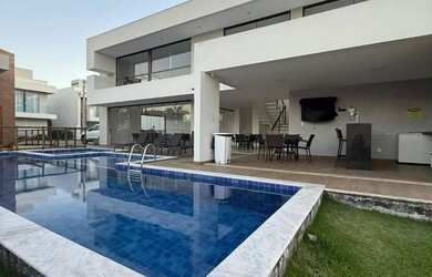 Imagem: A casa em condomínio à venda possui 4 Dormitórios, 4 Banheiros