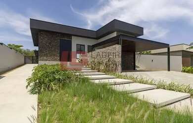 Imagem: A casa possui 5 Dormitórios, 5 Banheiros, 5 Vagas na garagem