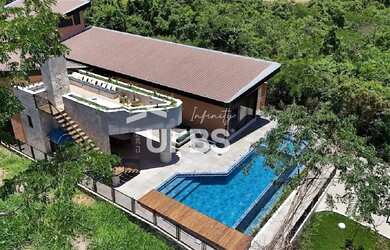 Imagem: A casa em condomínio possui 4 Dormitórios, 5 Banheiros, 4