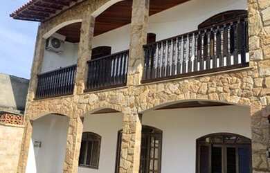 Imagem: A casa possui 2 Dormitórios, 3 Banheiros, 3 Vagas na garagem