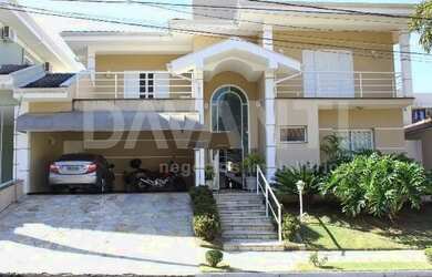 Imagem: A casa em condomínio possui 4 Dormitórios, 5 Banheiros, 4