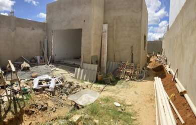 Imagem: A casa possui 3 Dormitórios, 2 Banheiros, 3 Vagas na garagem