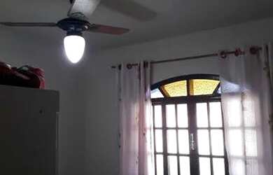 Imagem: A casa possui 2 Dormitórios, 1 Banheiro, 1 Vaga na garagem