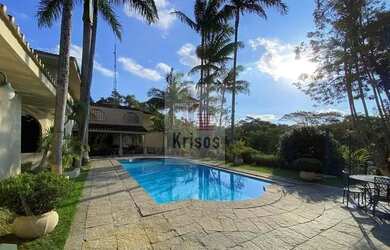 Imagem: A casa possui 5 Dormitórios, 5 Banheiros, 3 Vagas na garagem