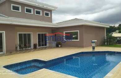 Imagem: A casa em condomínio possui 3 Dormitórios, 3 Banheiros, 4