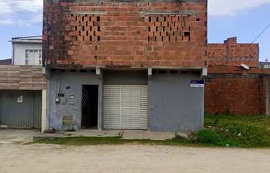 Imagem: A casa possui 2 Dormitórios, 1 Banheiro, 2 Vagas na garagem