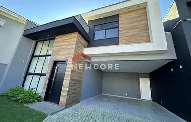 Imagem: A casa possui 3 Dormitórios, 3 Banheiros, 4 Vagas na garagem