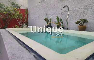 Imagem: A casa possui 5 Dormitórios, 4 Banheiros, 3 Vagas na garagem